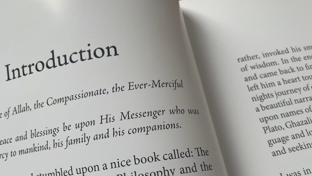 Open book with 'Introduction' text on a wooden surface